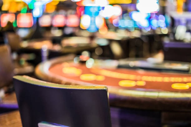 Multi-currency live-dealer table interface showing IDR, MYR, and THB denomination options